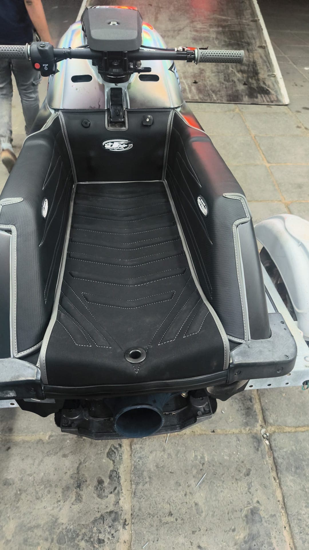 Black and gray custom jet ski seat with contrast piping and marine stitching by Shakeel Marine in Kuwait