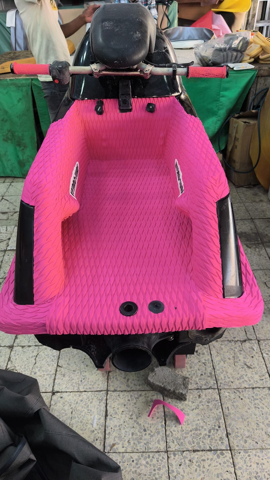 Model-specific jet ski floor mat with finished edges and drain cutouts by Shakeel Marine in Kuwait