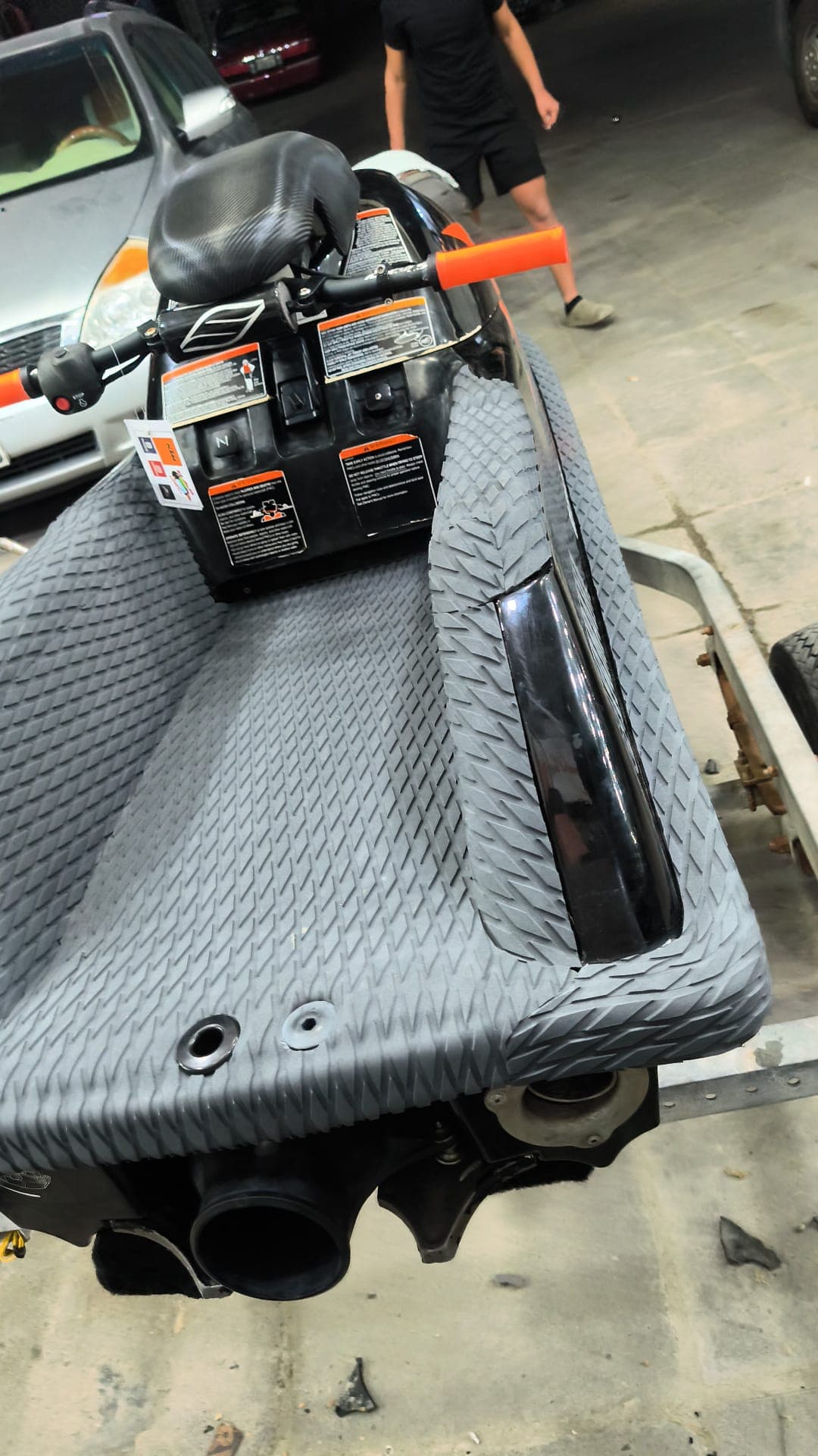 Marine-grade floor mat installed around a jet ski seat and footwell by Shakeel Marine in Kuwait