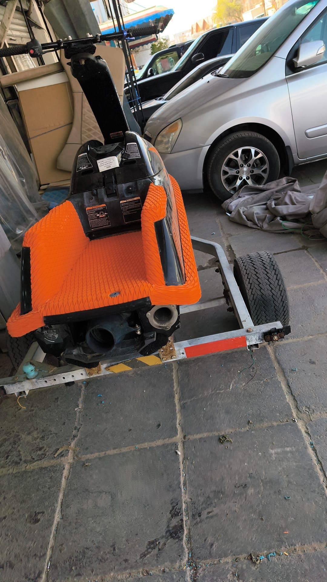Custom floor mat installation shown around the jet ski seat base by Shakeel Marine in Kuwait